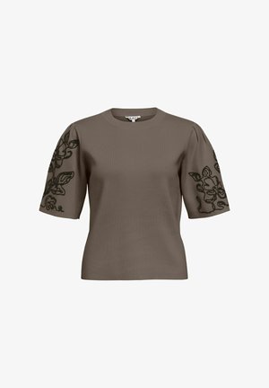 Haut taupe à manches courtes avec encolure arrondie et broderie florale noire sur les manches bouffantes.