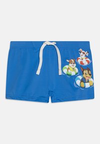 Costumi da bagno blu realizzati in tessuto morbido, con vita regolabile tramite coulisse. Sulla parte anteriore sono stampate grafiche di cani su anelli gonfiabili colorati.