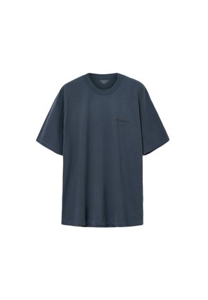 T-shirt a maniche corte in cotone grigio scuro. Collo a giro, vestibilità comoda, presenta un piccolo logo stampato sul lato sinistro del petto.