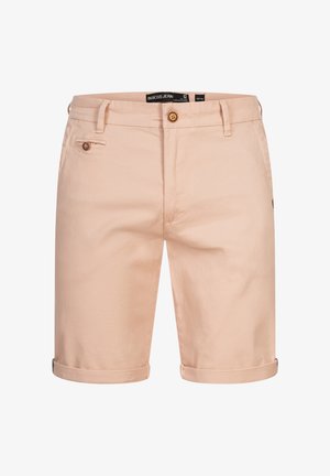 Pantalones cortos de color rosa claro hechos de una suave tela de algodón. Cuentan con un cierre de botón, bolsillos frontales y puños doblados para un estilo casual.