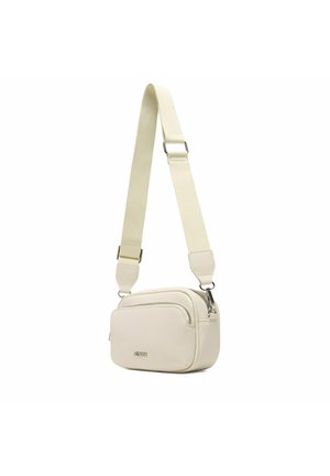 Kleine cremefarbene Umhängetasche mit verstellbarem, breitem Riemen und vorderer Reißverschlusstasche, minimalistisches Design mit Metall-Logodetail.