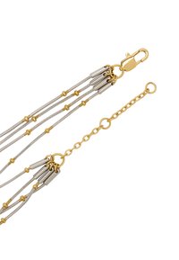 Złoty i srebrny wielorzędowy łańcuszek z teksturowanymi ogniwami, wyposażony w zapięcie typu karabińczyk oraz regulowany łańcuszek z okrągłymi ozdobnymi ogniwami.