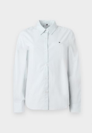 Svjetloplavi i bijeli prugasti dukserica dugih rukava s ovratnikom na gumbe, sa malim logotipom i teksturiranom tkaninom.