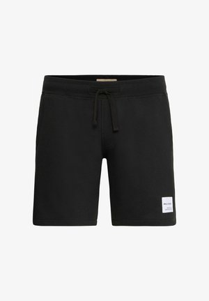 Juodos medvilnės mišinio šortai su elastinga juostos juosta, raišteliu ir baltu etikete apatinėje pusėje. Lygus paviršius, kasdienis dizainas.