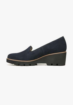 Navy blue suede wedge shoes with a rounded toe, slip-on design, and a textured black rubber sole featuring deep tread for grip.
