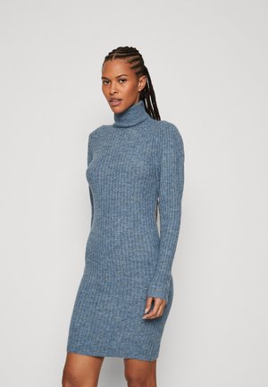 Ribbed turtleneck dress in a soft blue knit fabric. Form-fitting silhouette with long sleeves and a mid-thigh length for a sleek look.
