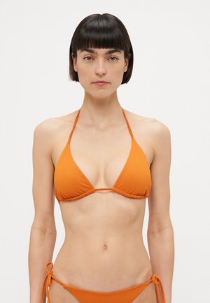 Orange bikini set with a triangle top and adjustable ties. Smooth fabric with gathered stitching at the bottom. Minimalistic design.