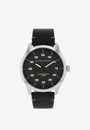 Round silver wristwatch with black leather strap, black textured dial, luminous yellow hour and minute hands, and white numeric markers in increments of five.
