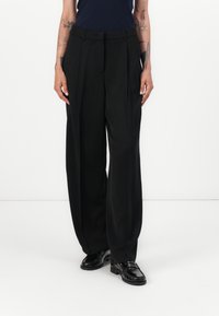 Tommy Hilfiger RELAXED STRAIGHT - Trousers - black