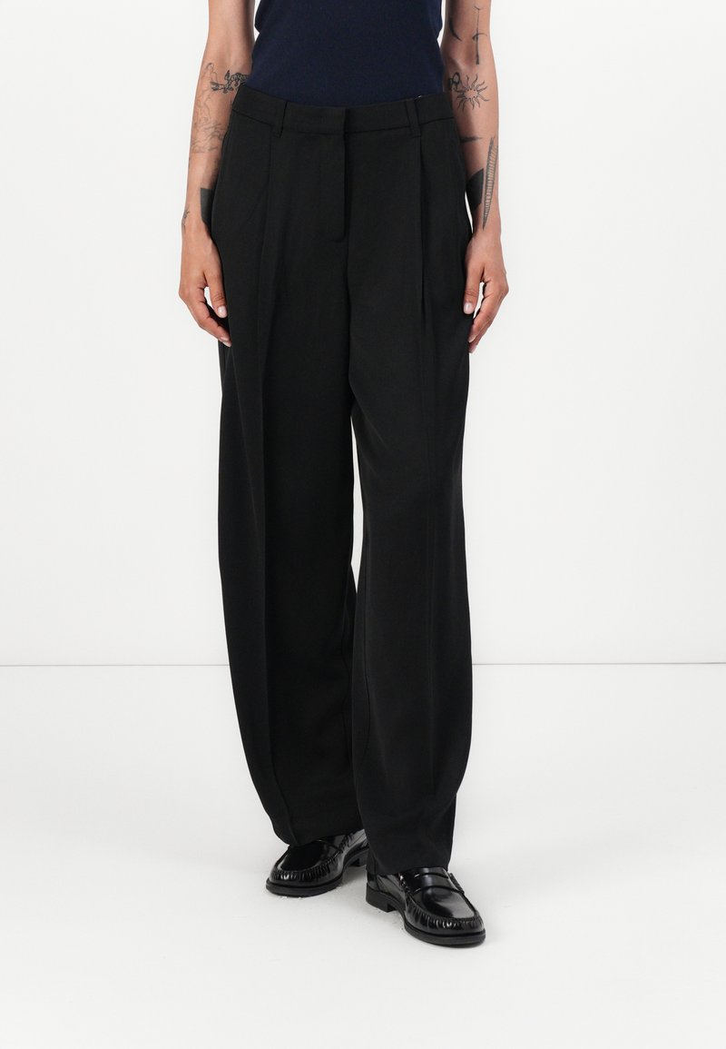Tommy Hilfiger RELAXED STRAIGHT - Trousers - black