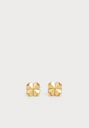 Gold stud earrings shaped like a four-leaf clover, featuring a polished finish with alternating curved and flat surfaces.