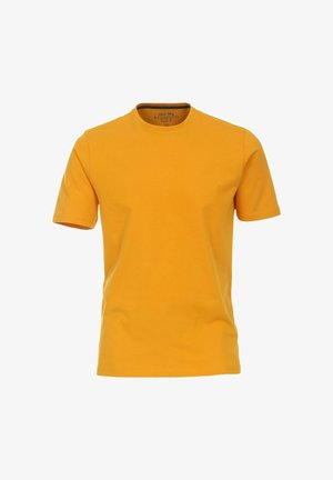 Gul bomulds T-shirt med korte ærmer og rund halsudskæring. Glat tekstur, almindelig pasform, mærket med "Redmond" indeni.