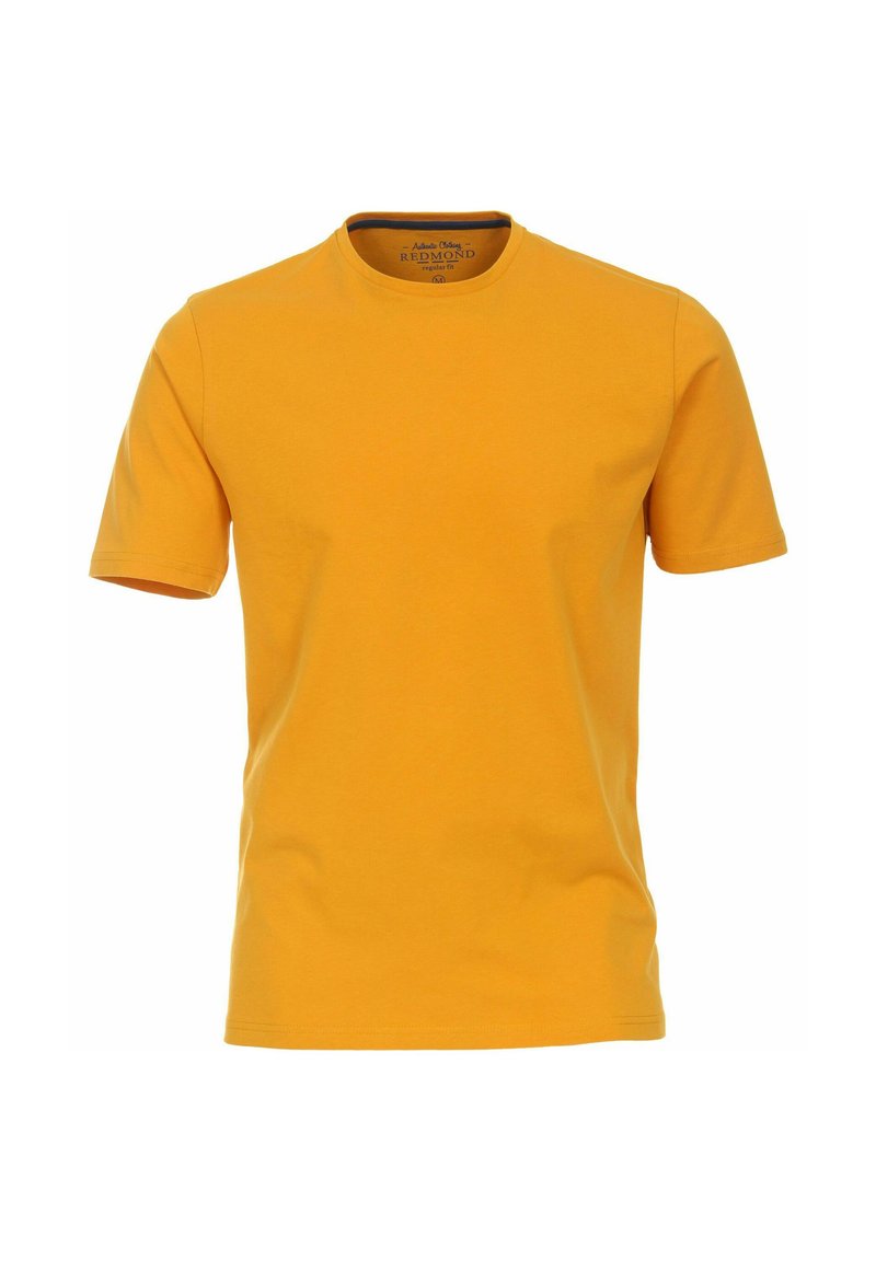 Gul bomulds T-shirt med korte ærmer og rund halsudskæring. Glat tekstur, almindelig pasform, mærket med "Redmond" indeni.