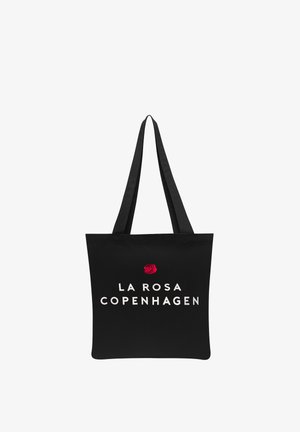 Sac fourre-tout noir avec deux poignées, arborant un texte blanc « LA ROSA COPENHAGUE » et un graphisme de rose rouge au-dessus du texte.