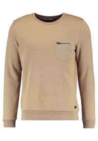 Felpa beige con scollo rotondo e maniche lunghe, dotata di una tasca sul petto con cerniera e orlo a coste. Tessuto dalla consistenza morbida.