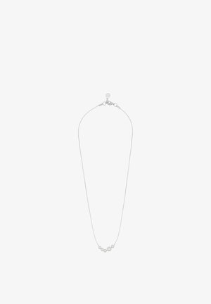 Silver chain necklace with seven evenly spaced round silver beads of varying sizes near the center and a lobster clasp closure.