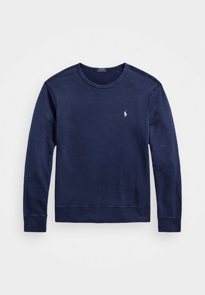 Sweatshirt azul-escuro feito de algodão, com decote redondo, mangas compridas, punhos canelados e um pequeno logótipo bordado no peito.