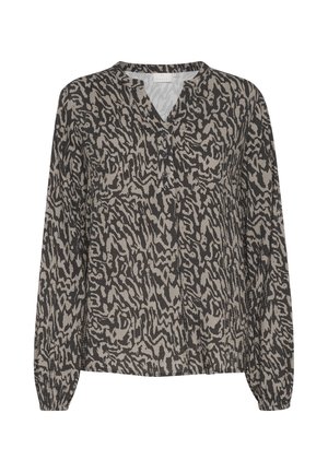 Halenka s dlouhým rukávem v béžovém a černém zvířecím vzoru, se lodičkovým výstřihem, knoflíkovými detaily a volným střihem. Měkká, texturovaná tkanina.