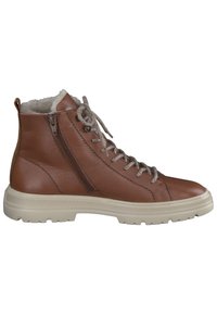 Bottines en cuir marron avec des lacets gris, doublure en fourrure, zip sur le côté et semelle en caoutchouc crème. Cuir texturé avec des coutures renforcées.
