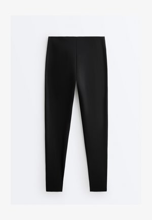 Black high-waist slim-fit leggings with a seamless design and a smooth, stretchy fabric texture.