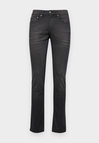 Jean en denim noir à coupe droite, avec un léger dégradé, un design à cinq poches et des garnitures en métal argenté sur l'avant.