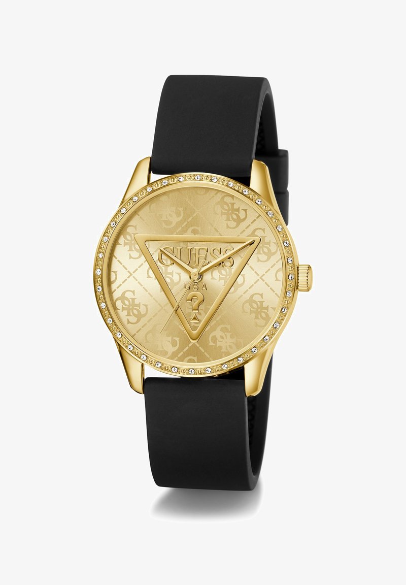 Orologio dorato con cassa rotonda, cinturino in silicone nero, motivo a logo in rilievo e accenti di cristallo attorno al quadrante.