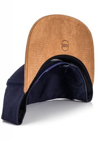 Cap with a brown suede brim and navy cotton body. Features a logo on the inner side and smooth texture, designed for casual wear.