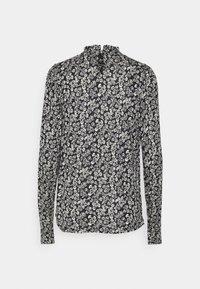 Langsleeve blouse van lichtgewicht stof, met een marineblauwe achtergrond en witte bloemenpatronen, en een gerimpelde opstaande kraag.