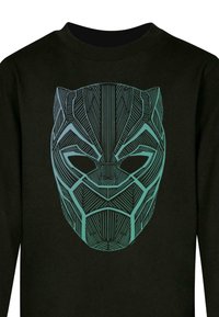 Svart sweatshirt med en stiliserad grön grafik av en pantermask, som visar geometriska mönster och uttalade linjedetaljer.
