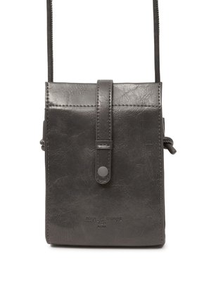 Small dark gray leather crossbody bag with front flap, snap button strap, and embossed "nice things" logo on the lower front.