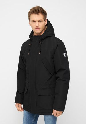 Schwarze Kapuzenjacke mit einem Frontreißverschluss, elastischen Kordelzügen, zwei seitlichen Taschen und einer Brusttasche. Hergestellt aus einem glatten, wasserabweisenden Material.