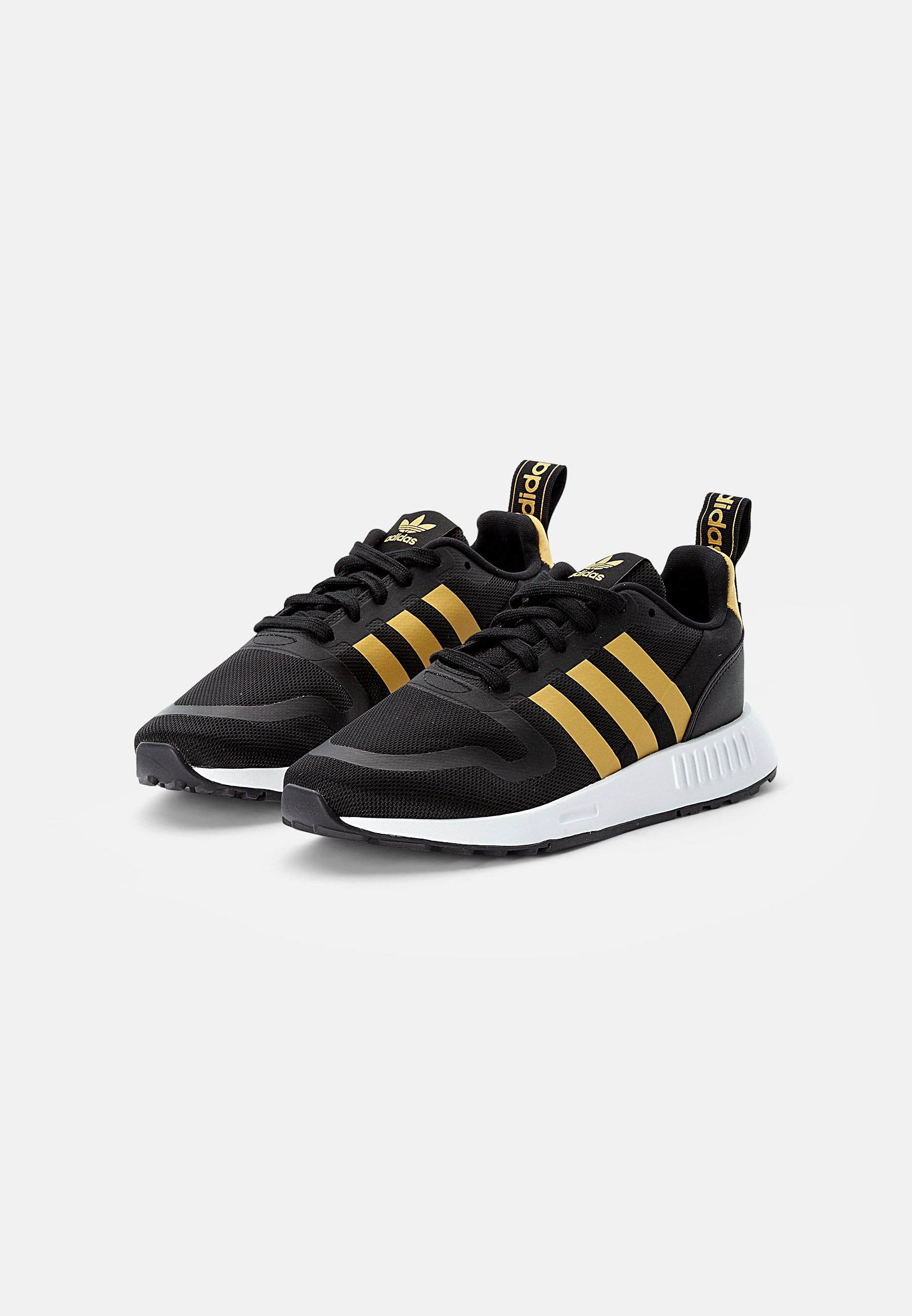 black and gold swift run adidas