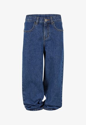 Luźne niebieskie dżinsy z widocznymi przednimi kieszeniami, szlufkami na pasek, zapięciem na guzik oraz marszczonymi mankietami przy kostkach.