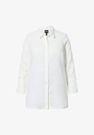 Hvid linnedskjorte med skræddersyet krave, lange ærmer og lige snit. Har en knaplukning foran og tekstureret stof.