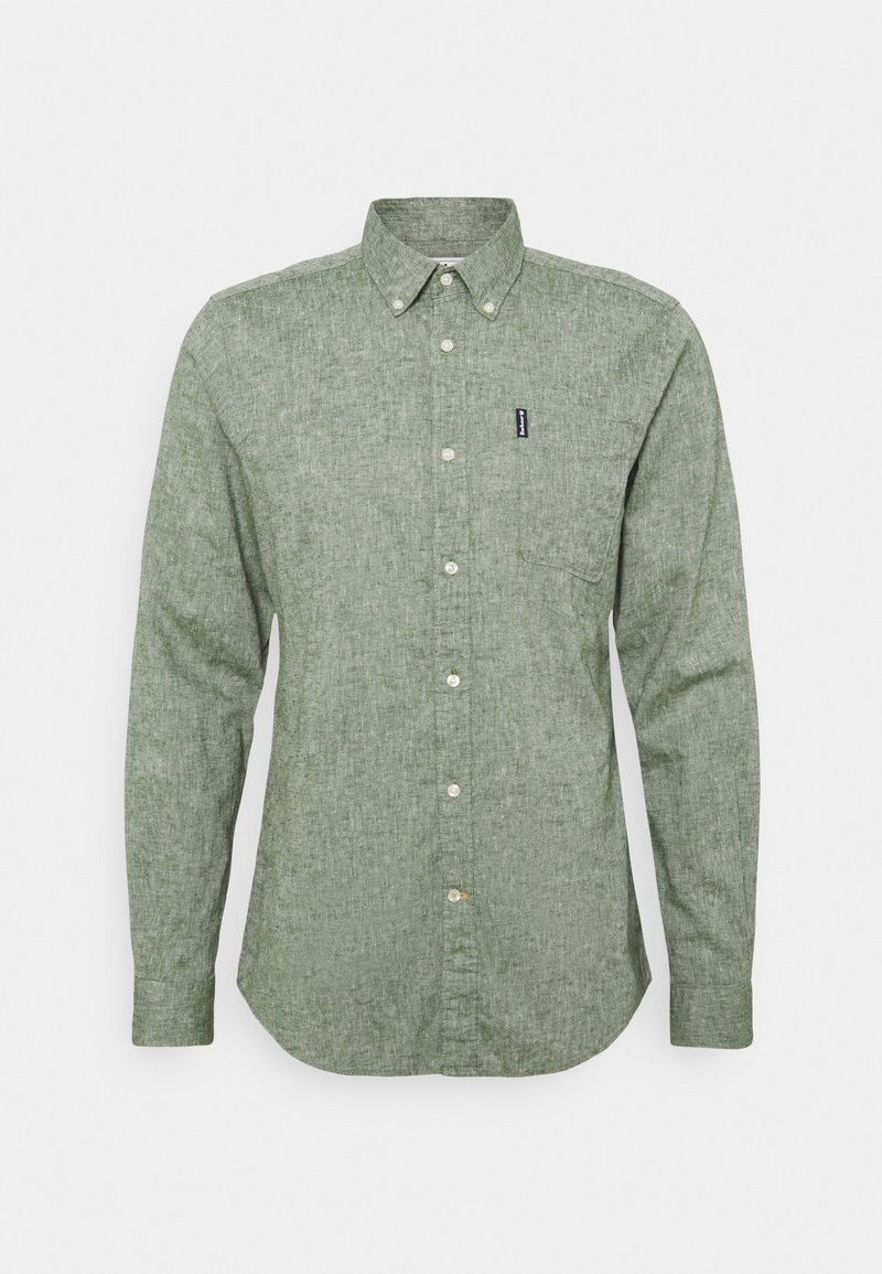 Zelená košile s dlouhým rukávem na knoflíky z texturované látky, s špičatým límečkem, přední kapsou a malým logem na levé hrudi.