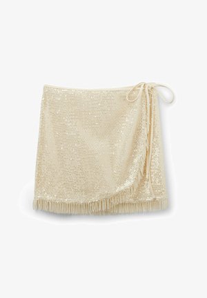 Falda envolvente de lentejuelas beige con dobladillo de flecos y cierre lateral con lazo, diseñada para uso festivo o de noche.