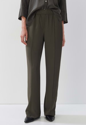 Olivgrüne, weit geschnittene Hosen mit einem elastischen Bund. Hergestellt aus glattem Material, mit einem schlichten Design und dezenten Nähdetails.
