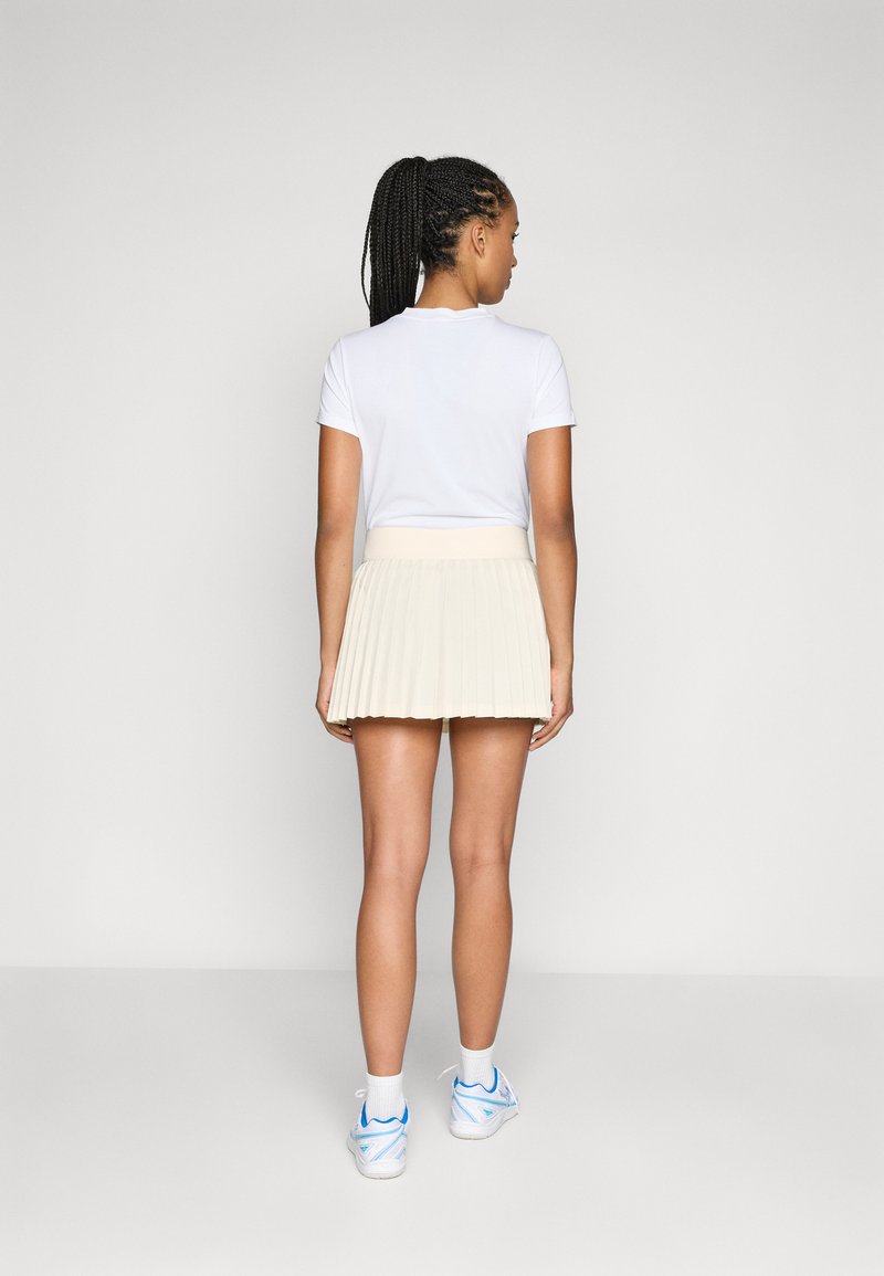 Jupe de tennis New Balance Women Rally Court Skort Dragonfly Jupe de tennis New Balance Women Rally Court Skort Dragonfly