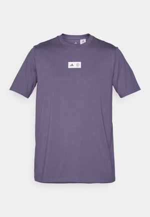 adidas Performance MANCHESTER UNITED SEASONAL GRAPHIC TEE - T-shirts med print - trace purple