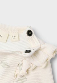 Lil' Atelier STRAMPLER - Body - pastel parchment
