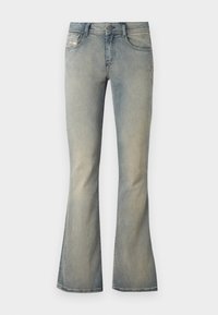 Lyse blå denim flared jeans med mid-rise liv, subtil fading og standard fem-lomme design. Har en front knappelukking.