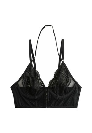 Juoda braletė su nėrinių apdaila, tinkliniais elementais ir priekiniu užsegimu. Reguliuojami petnešėlės ir struktūrinis dizainas užtikrina geresnį prigludimą.