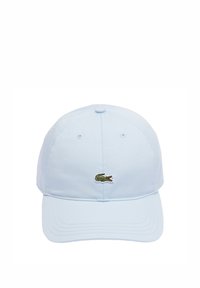 Lichtblauwe katoenen honkbalpet met een afgeronde kroon, een gebogen klep en een klein geborduurd groen krokodillenlogo aan de voorkant.