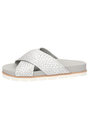 Woven silver leather slide sandal with a soft gray footbed and white rubber sole, featuring crisscross straps and a flat design.