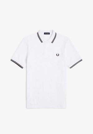 Witte polo met korte mouwen, zwarte dubbele strepen op de kraag en mouwranden, met een zwart lauwerkranslogo op de borst.