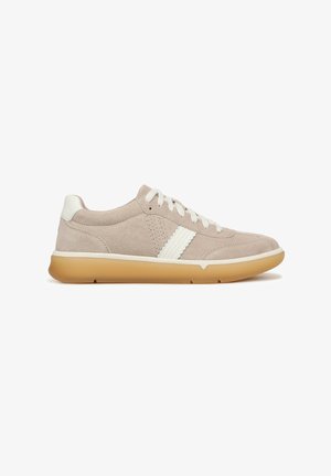 Beige suede low-top sneaker with white laces, white side stripes, padded collar, and gum rubber sole against white background.