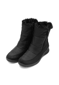 Botas aisladas negras con forro de pelo sintético, cierres de cremallera en el costado y una suela de goma texturizada. Acentos de tejido suave y ante.