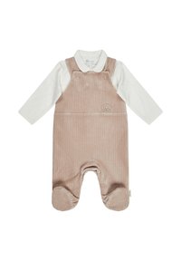 Rosa Corduroy-Latzhose mit einem weißen Langarmshirt darunter, das ein Hundenmotiv zeigt, und elastischen Fußöffnungen für zusätzlichen Komfort.