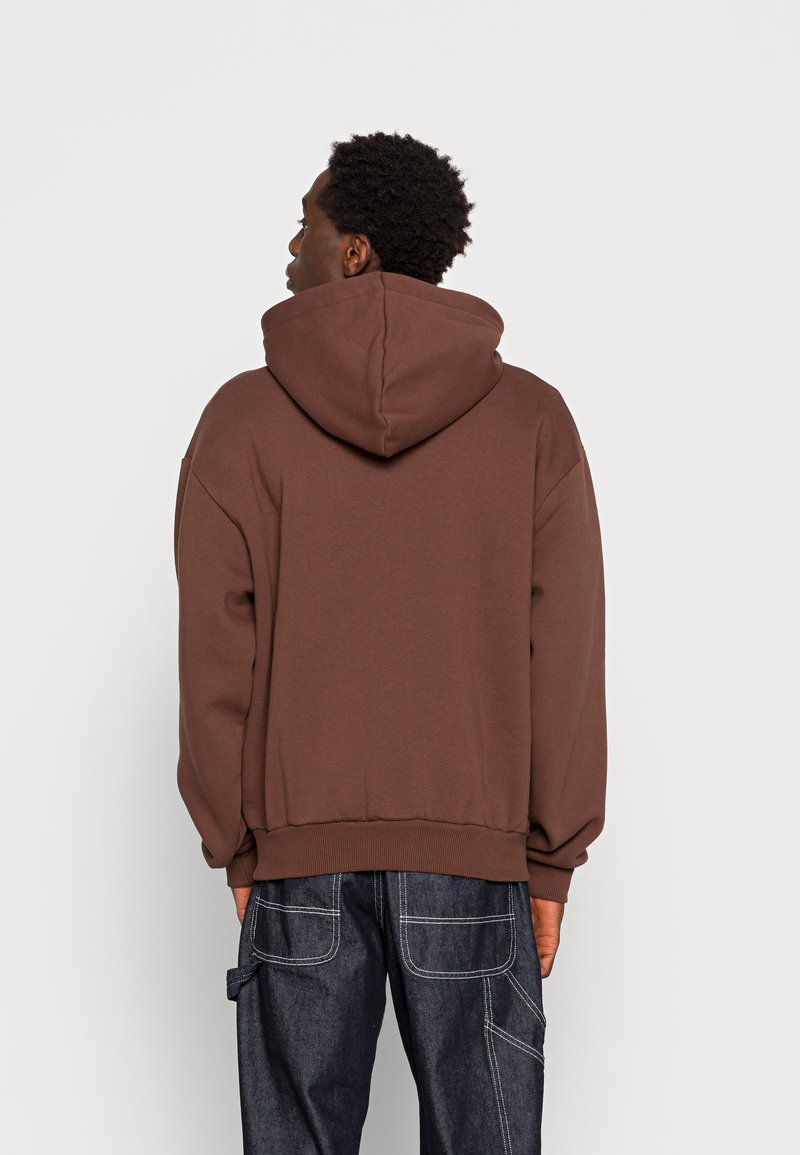 Herren Kapuzenpullover | Karl Kani AUTOGRAPH HOODIE UNISEX Kapuzenpullover brown/braun - PH17500 Herren Kapuzenpullover | Karl Kani AUTOGRAPH HOODIE UNISEX Kapuzenpullover brown/braun - PH17500