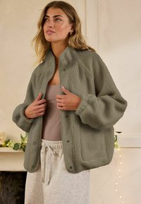 Next Polárdzseki - khaki green